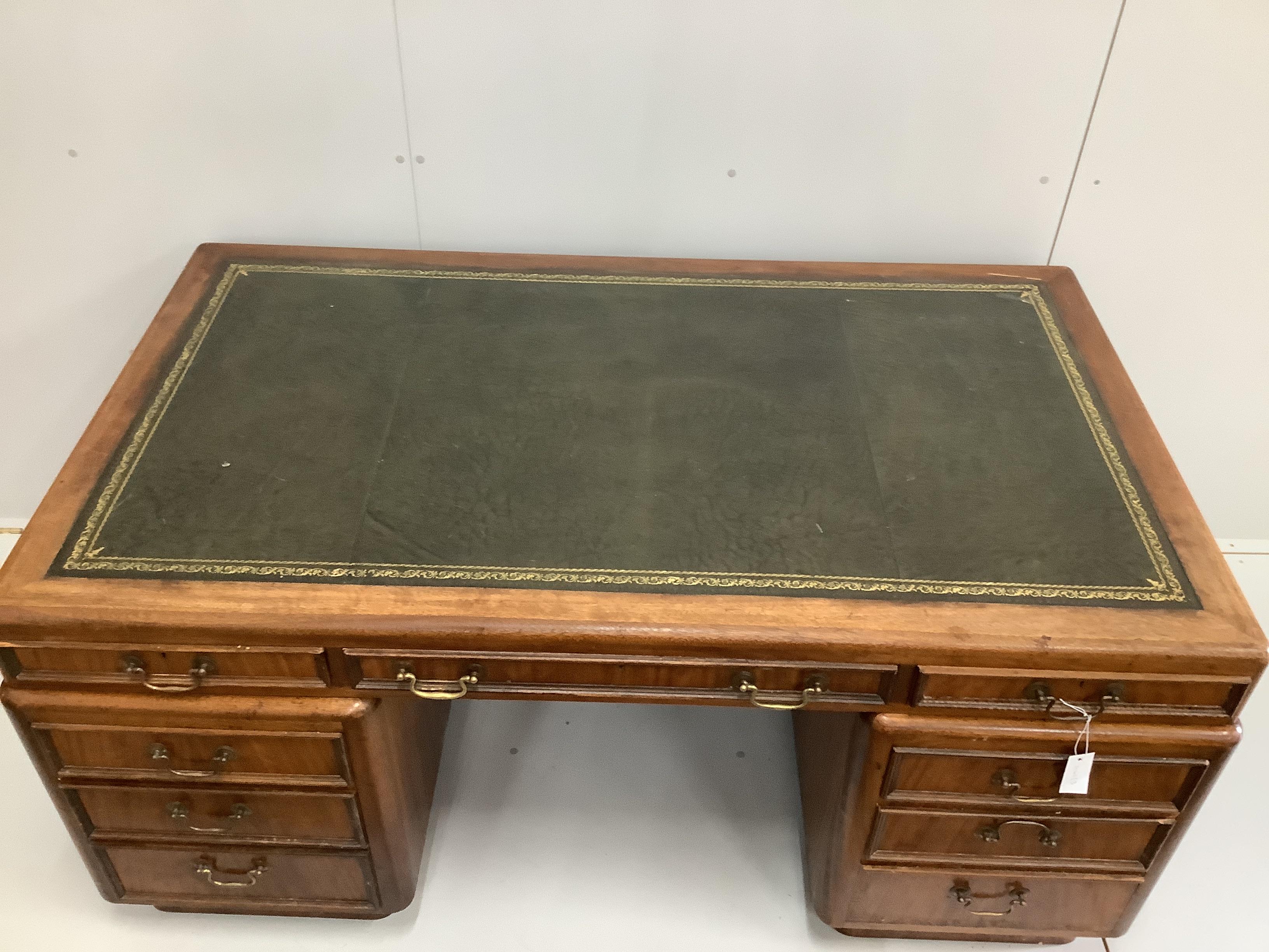 A mid century mahogany pedestal desk, width 162cm, depth 93cm, height 76cm